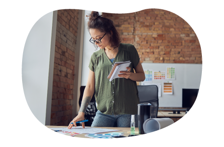 Interior designer formulating a floor plan. Interior designer formulating a floor plan.