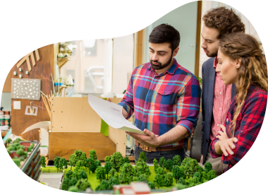 Landscape architect sharing plans with colleagues.