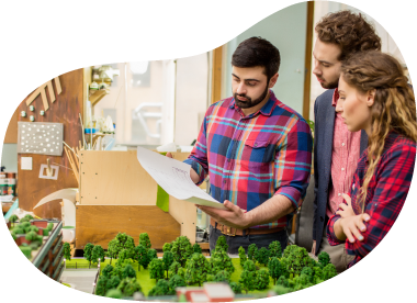 Landscape architect sharing plans with colleagues. Landscape architect sharing plans with colleagues.