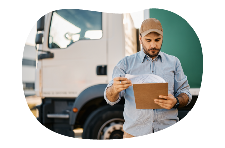Truck driver looking through routes for transportation of cannabis products.