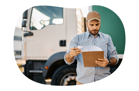 Truck driver looking through routes for transportation of cannabis products. Truck driver looking through routes for transportation of cannabis products.