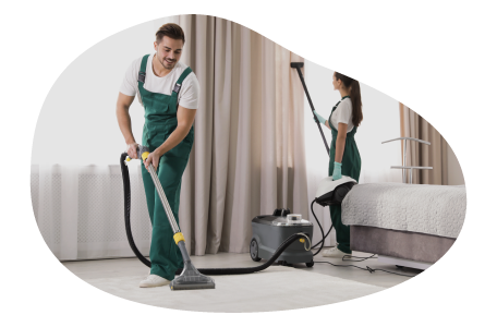 Carpet cleaners working in a client's residence. Carpet cleaners working in a client's residence.