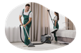 Carpet cleaners working in a client's residence.