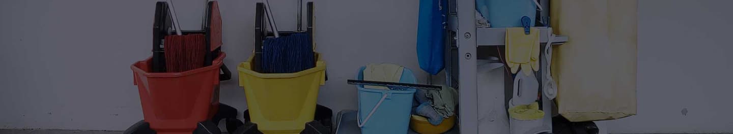 Janitorial supplies leaning against a wall. Janitorial supplies leaning against a wall.