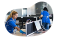 Janitorial professionals cleaning office desks.