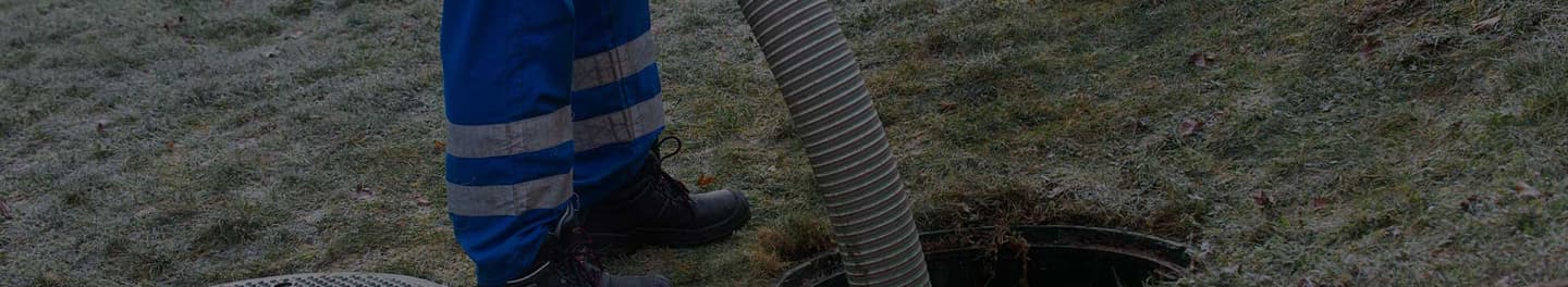 Septic tank cleaner in a client's yard