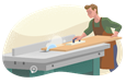 Man cutting a board on a table saw.