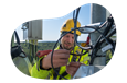 A cell tower technician performs routine maintenance.