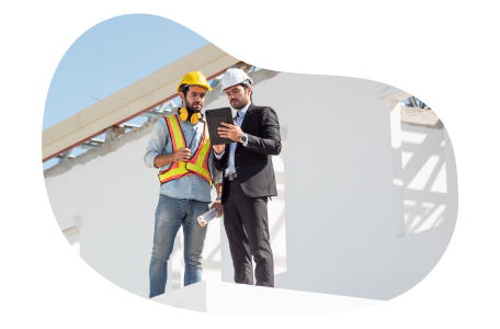 Commercial builder and client looking at blueprints. Commercial builder and client looking at blueprints.