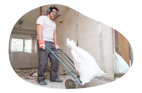 Debris removal contractor hauling debris from a worksite. Debris removal contractor hauling debris from a worksite.