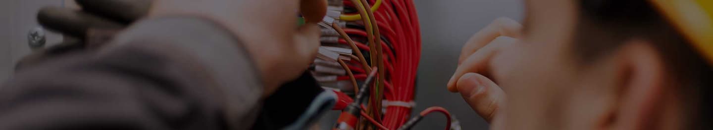 Electrician working with wires.