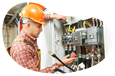 Electrician inspecting the wiring on a circuit breaker.