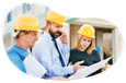 A group of framing contractors look over the blueprints to a building.
