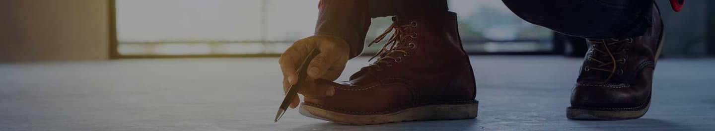 Home inspector checking the foundation of a home