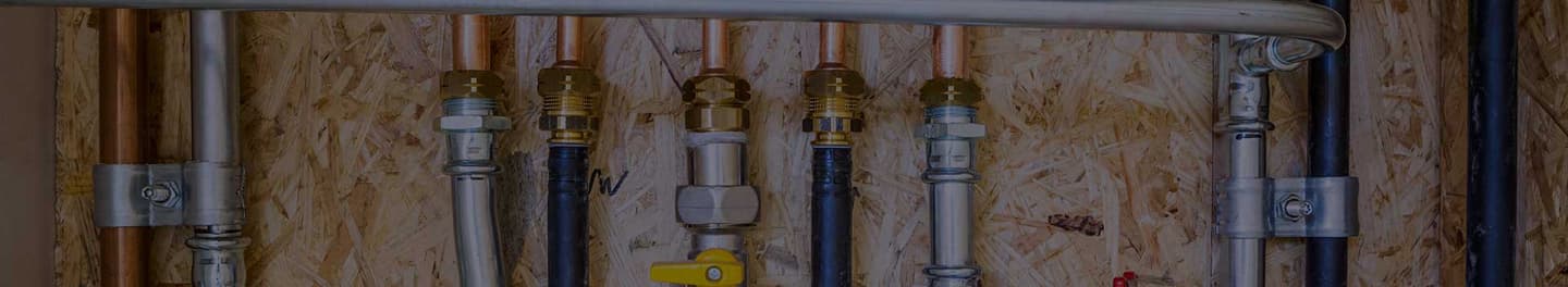 A view of plumbing for a house. A view of plumbing for a house.