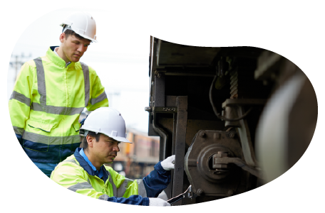 Railroad contractors working on a train.