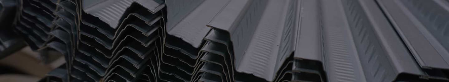 Large sheets of metal in a pile