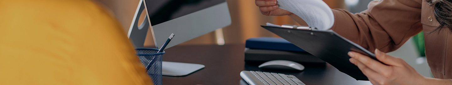 HR consultant going through paperwork.