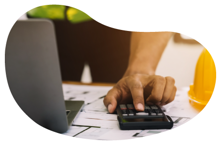 A contractor calculates business insurance costs. A contractor calculates business insurance costs.