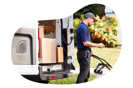 An Amazon Flex driver delivers a package to a home. An Amazon Flex driver delivers a package to a home.