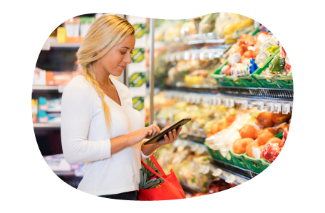 An Instacart shopper buying groceries for a customer.