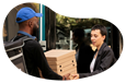 An Uber Eats driver delivers pizza to a customer.