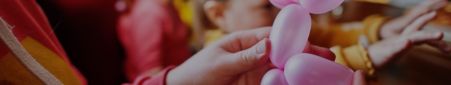 A creation made by a balloon artist in front of a crowd.