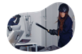 A rage room customer gets ready to strike with a bat.