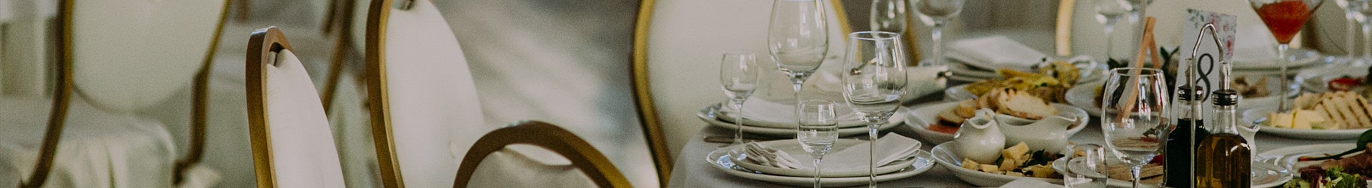 Decorated tables at a banquet hall.
