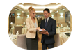 Banquet hall employees going over an event itinerary.