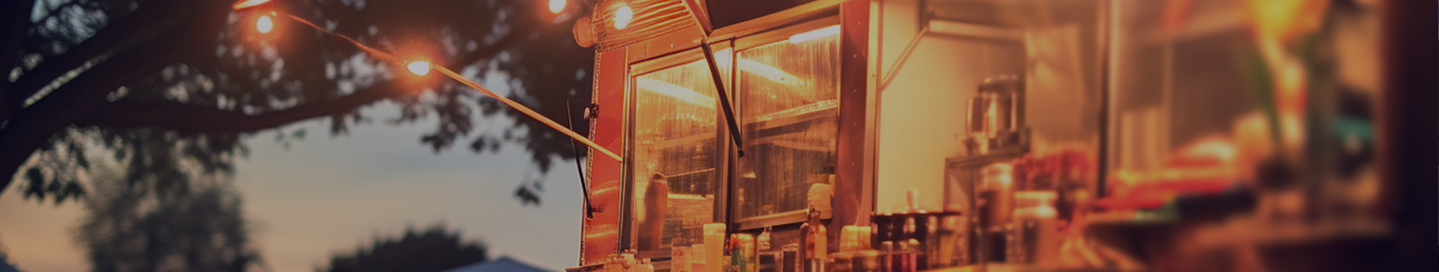 A food trailer parked outside at an event