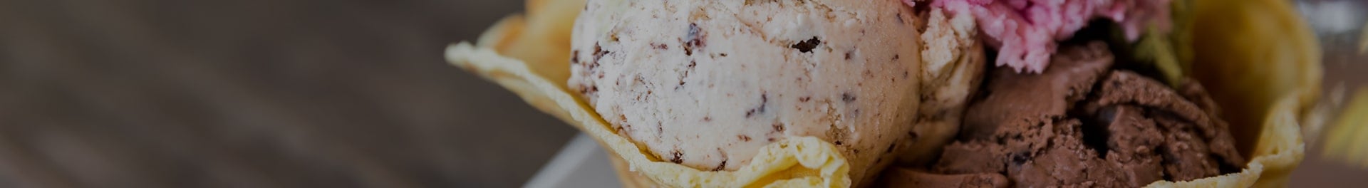 Several flavors of ice cream in a cone. Several flavors of ice cream in a cone.