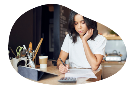 Food and beverage business owner calculating insurance costs. Food and beverage business owner calculating insurance costs.