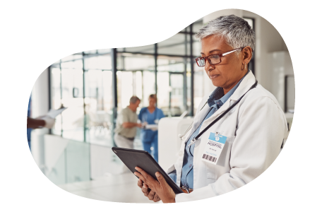 Doctor reviewing medical chart in an ambulatory surgery center.