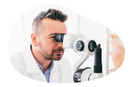 Doctor examining equipment in a laser eye center.
