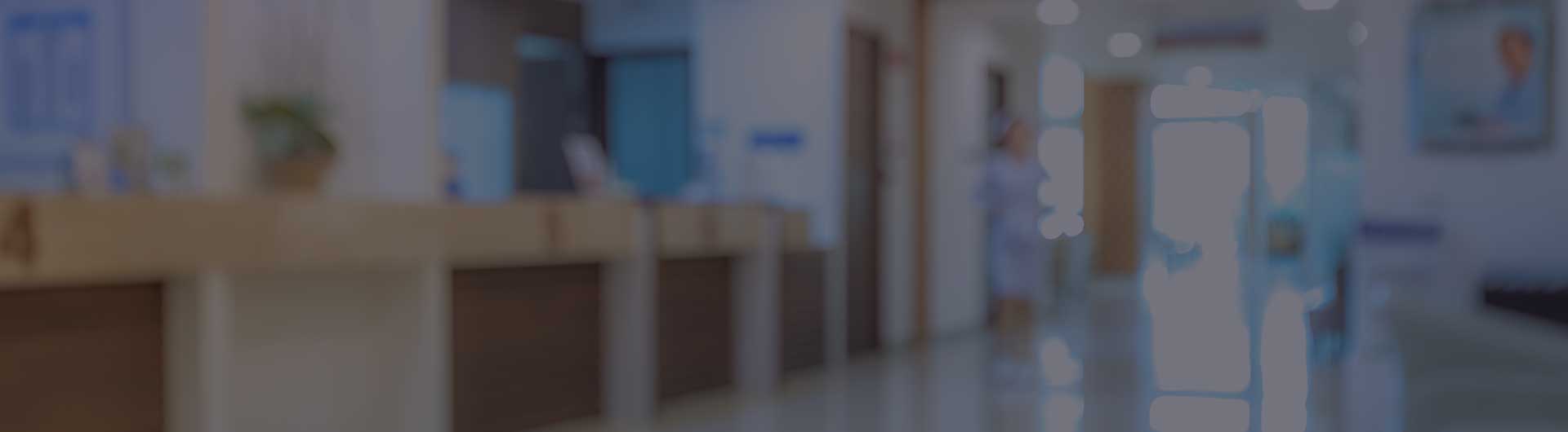 Blurred image of a lobby of a medical center.