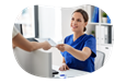 Patient handing paperwork to staff in a medical office.