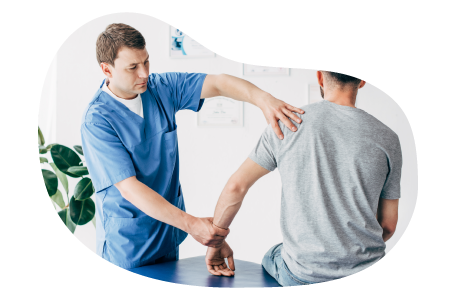 Chiropractor examining a patient's arm.