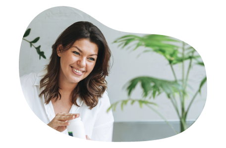 Dietitian observing home-grown plants.