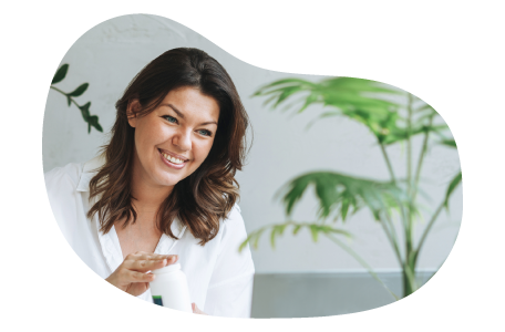 Dietitian observing home-grown plants.