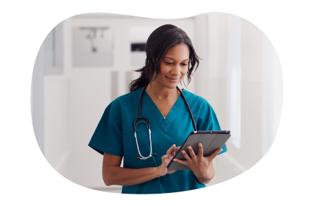 Doctor reviewing a medical chart. Doctor reviewing a medical chart.