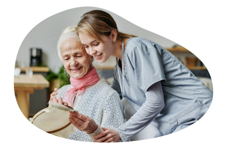 Home healthcare provider working with a patient. Home healthcare provider working with a patient.