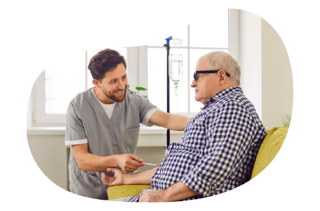 A patient receives IV therapy at a clinic.