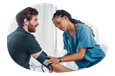 A medical assistant takes a patient's blood pressure.