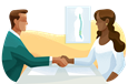 An employee shaking hands with a recruiter in a medical staffing agency.