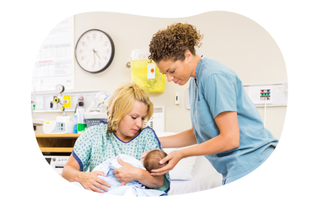 A midwife with a newborn baby and mother. A midwife with a newborn baby and mother.
