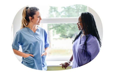 A nurse practitioner speaks with a patient.