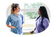 A nurse practitioner speaks with a patient.