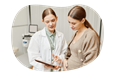An OB/GYN consults with a pregnant patient.
