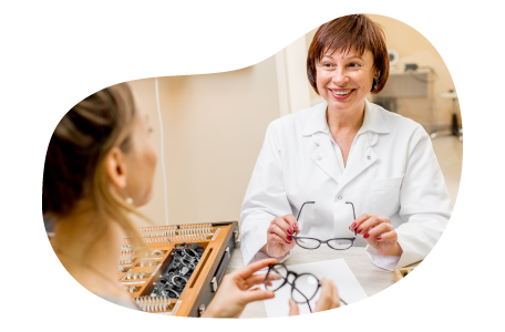 Optician testing glasses with a patient.